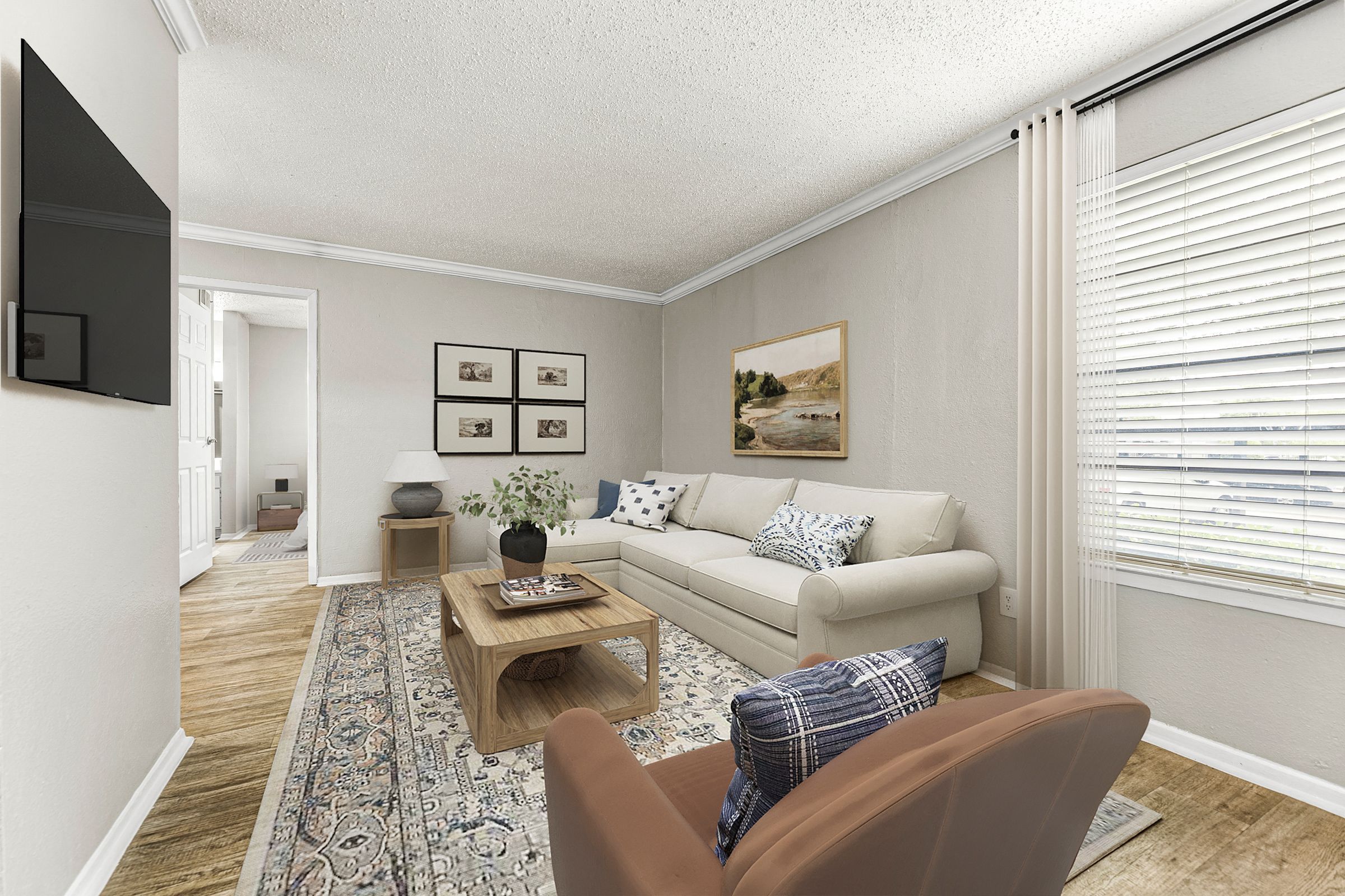a living room with a couch and a coffee table at 5636 Apartment Homes, Dallas, Texas  75254