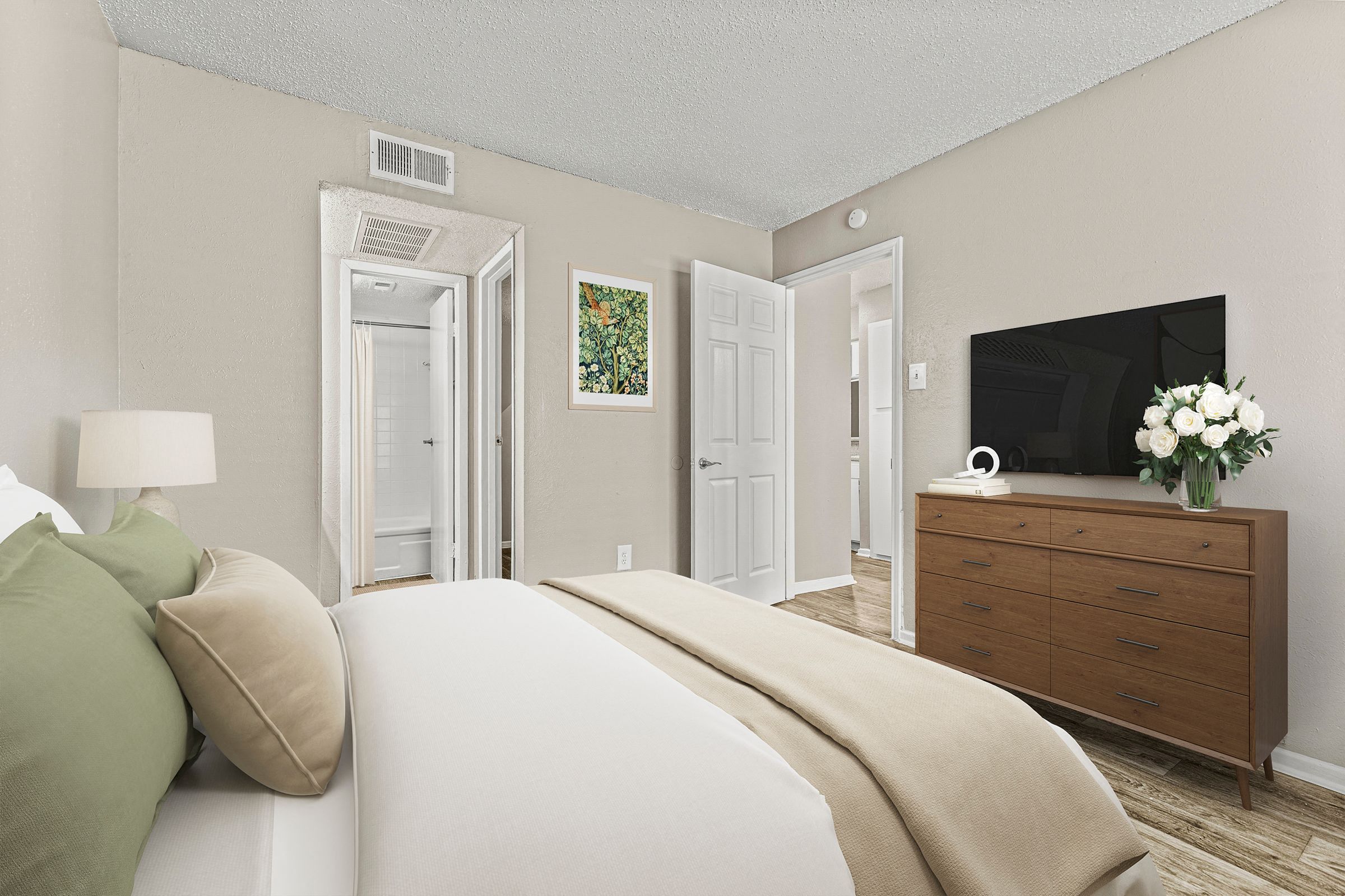 a bedroom with a bed and a tv at 5636 Apartment Homes, Texas, 75254