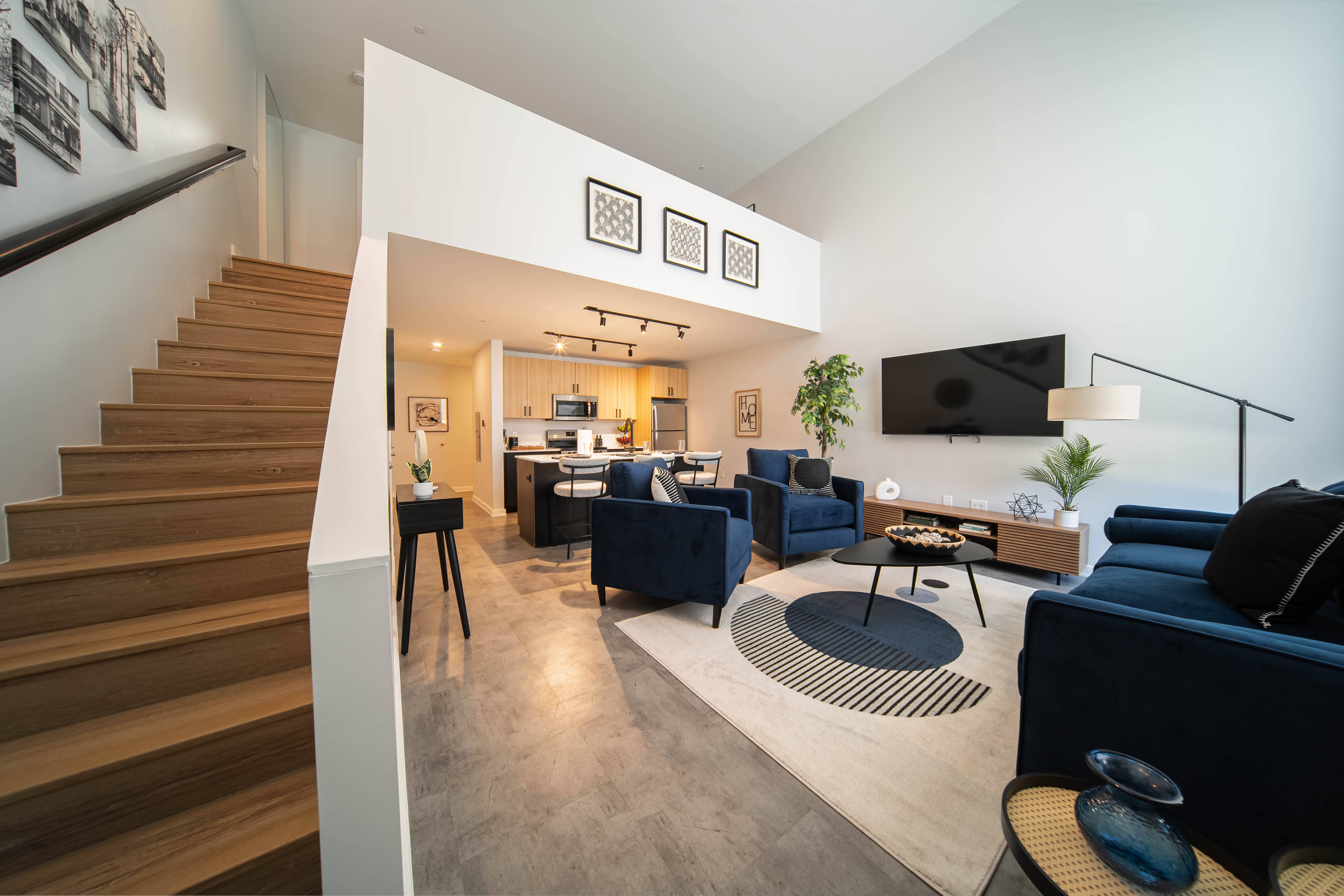 Open-concept loft living room at The George Apartments in Ann Arbor