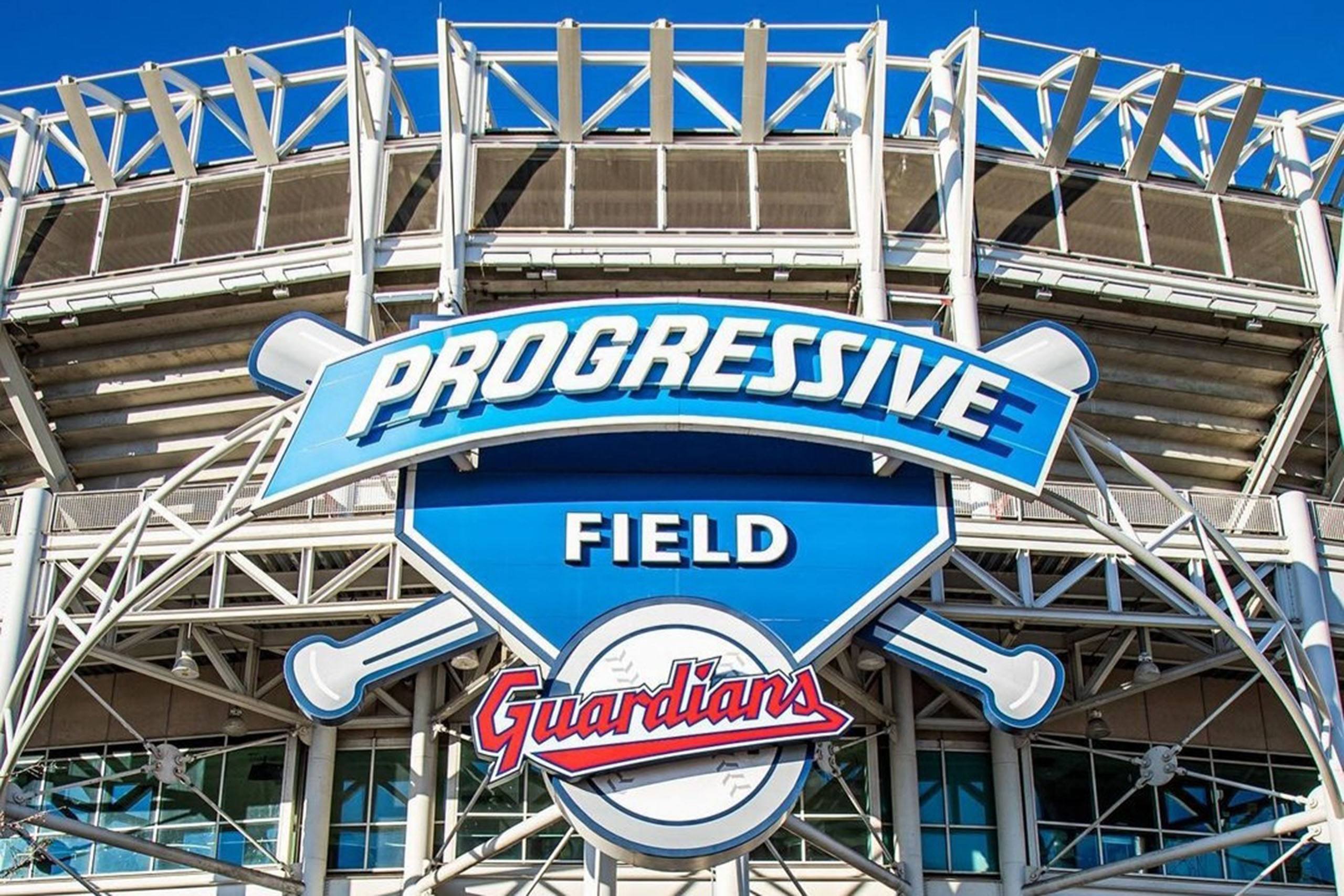 Close-up of the Progressive Field stadium sign and Cleveland Guardians logo in downtown Cleveland, located near The Terminal Tower Residences.