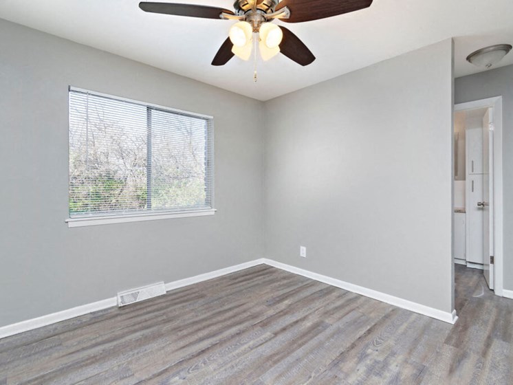large room with ceiling fan