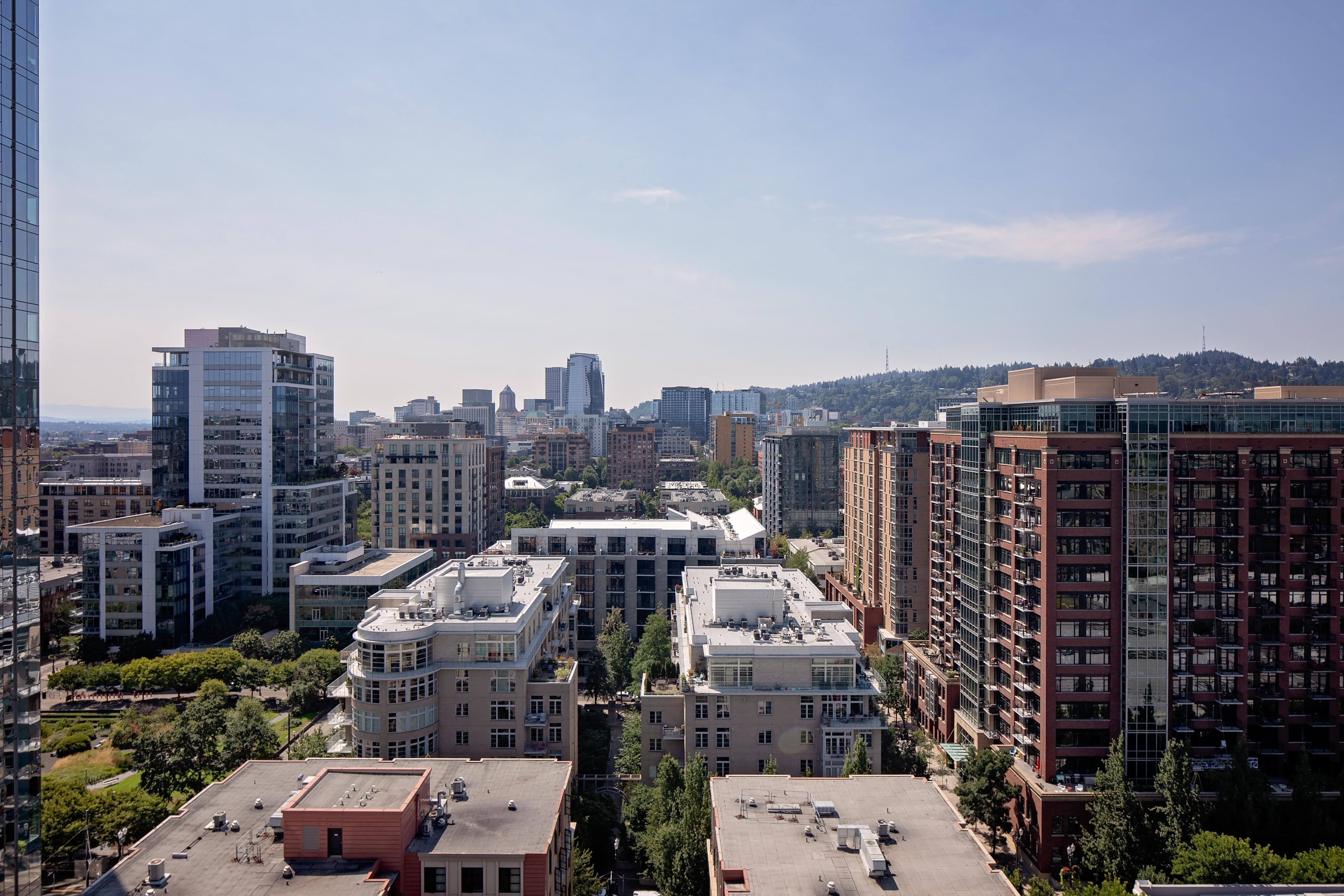 a view of the city from the roof of a building
