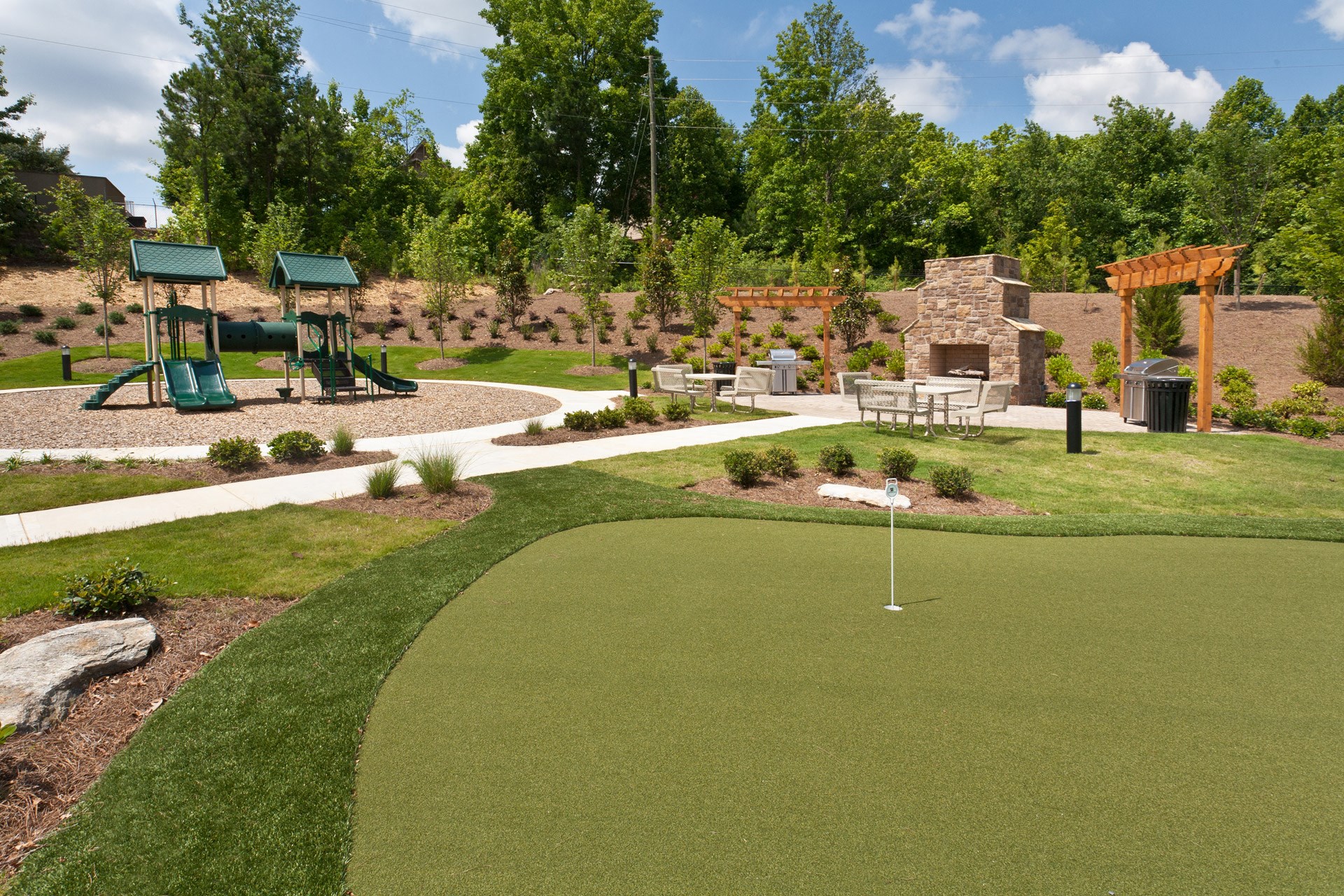 Apartments in Johns Creek - The Regency at Johns Creek Walk Apartments Playground and BBQ Area