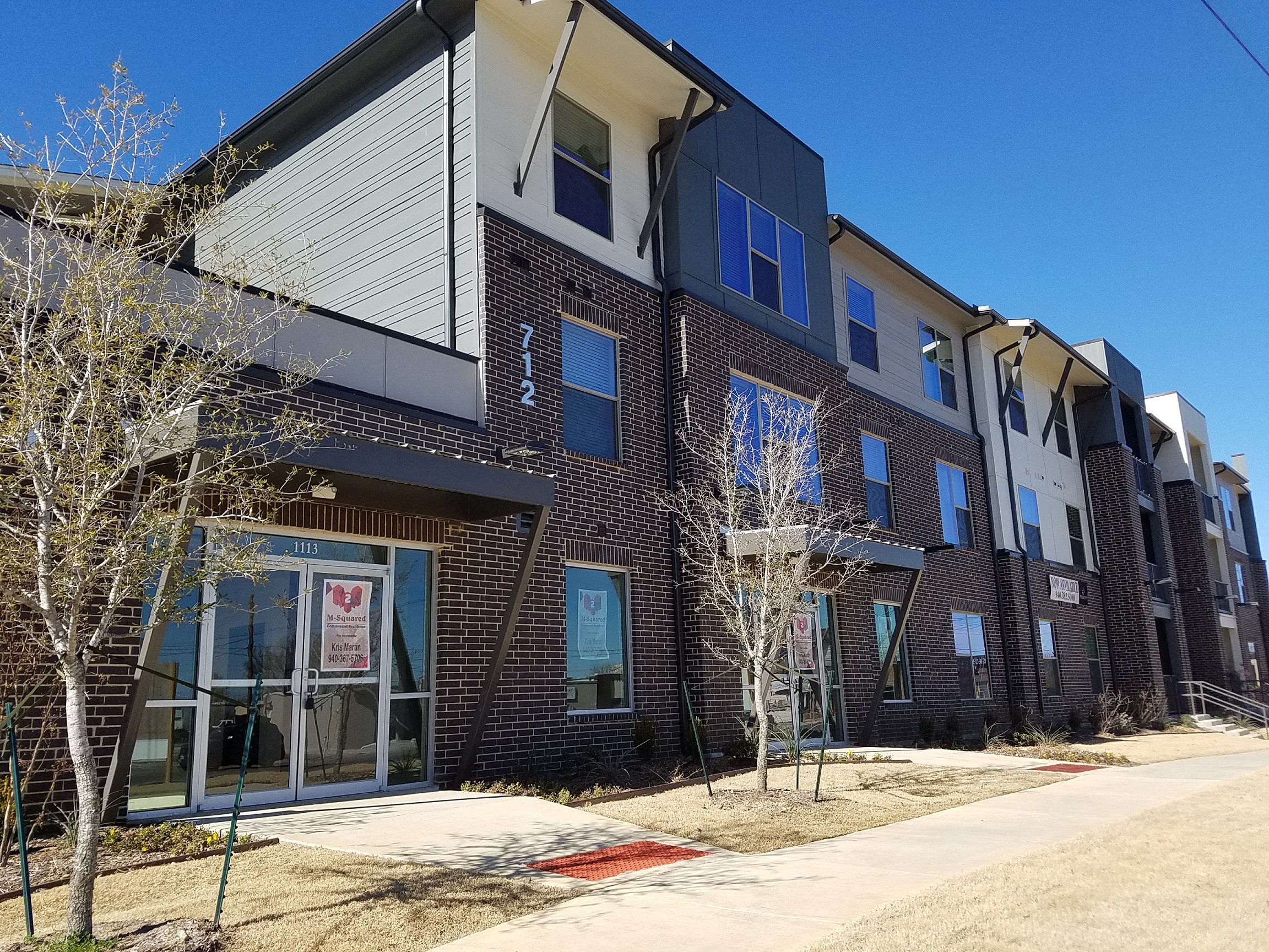 Building at SEVEN TWELVE LOFTS Apartments, Denton, TX