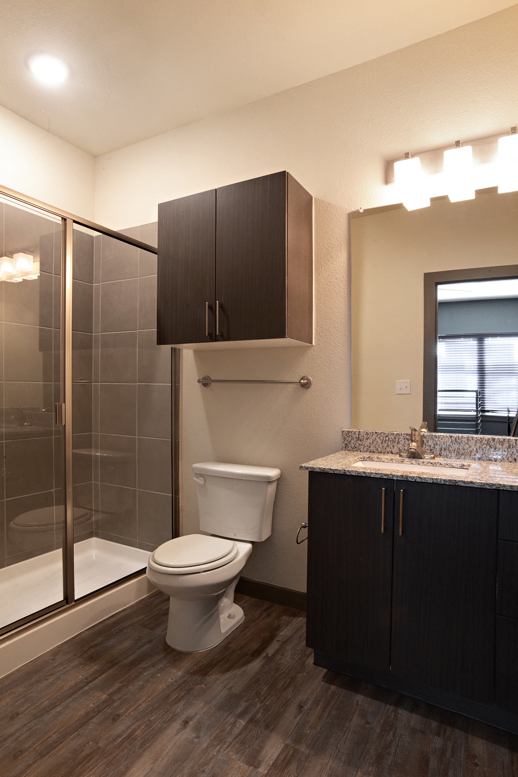 Bath with Shower at East End Lofts at the Railyard Apartments, Denton, TX, 76201