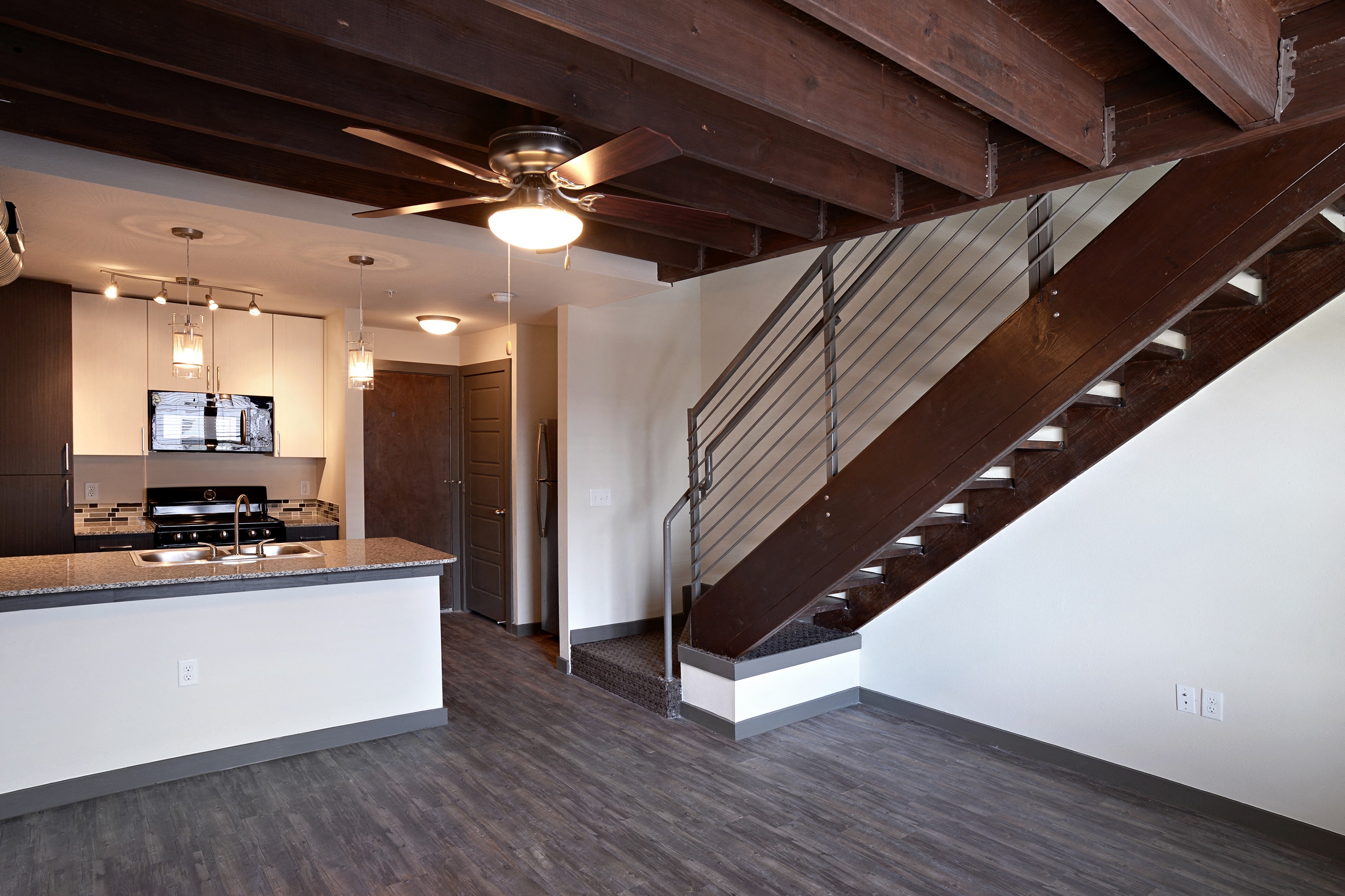 Bedrooms Living and Kitchen at East End Lofts at the Railyard Apartments, Denton, TX