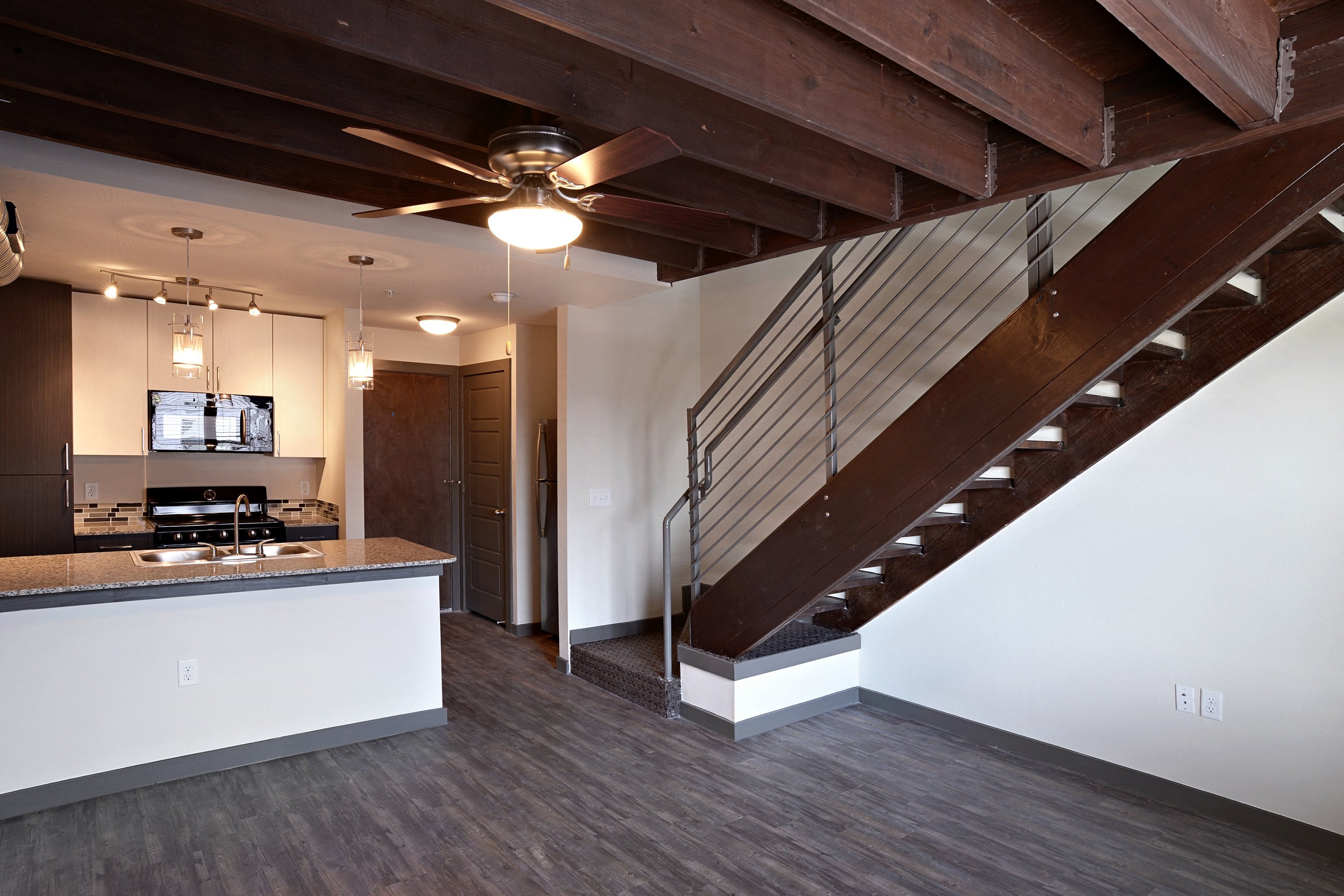 Bedrooms Living and Kitchen at East End Lofts at the Railyard Apartments, Denton, TX
