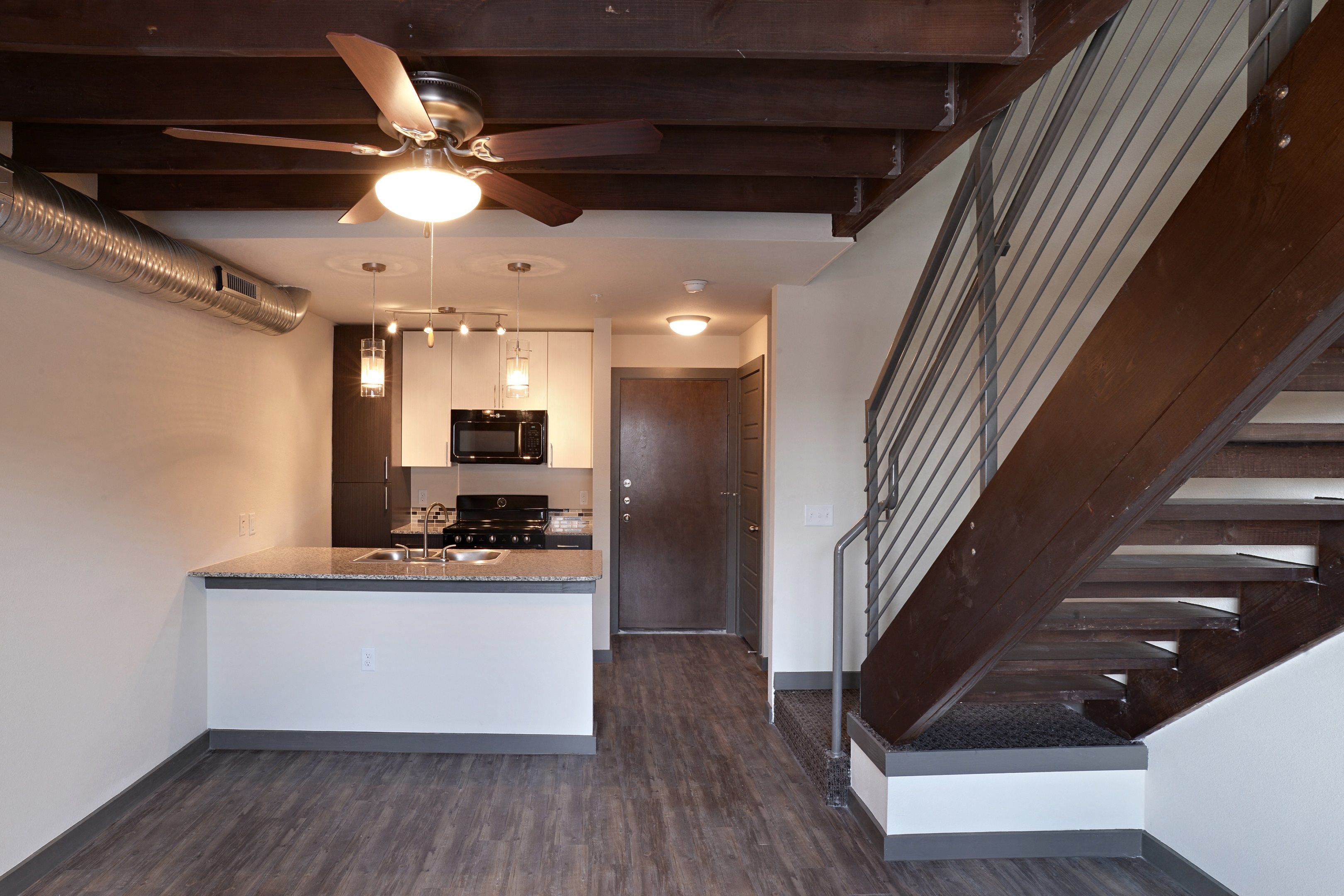 Living and Kitchen at East End Lofts at the Railyard Apartments, Denton, Texas