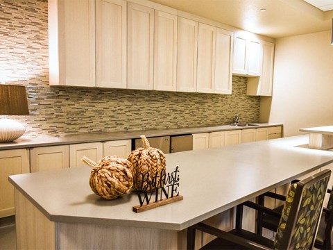 Breakfast bar with pendent lighting at Westmont of Milpitas, Milpitas