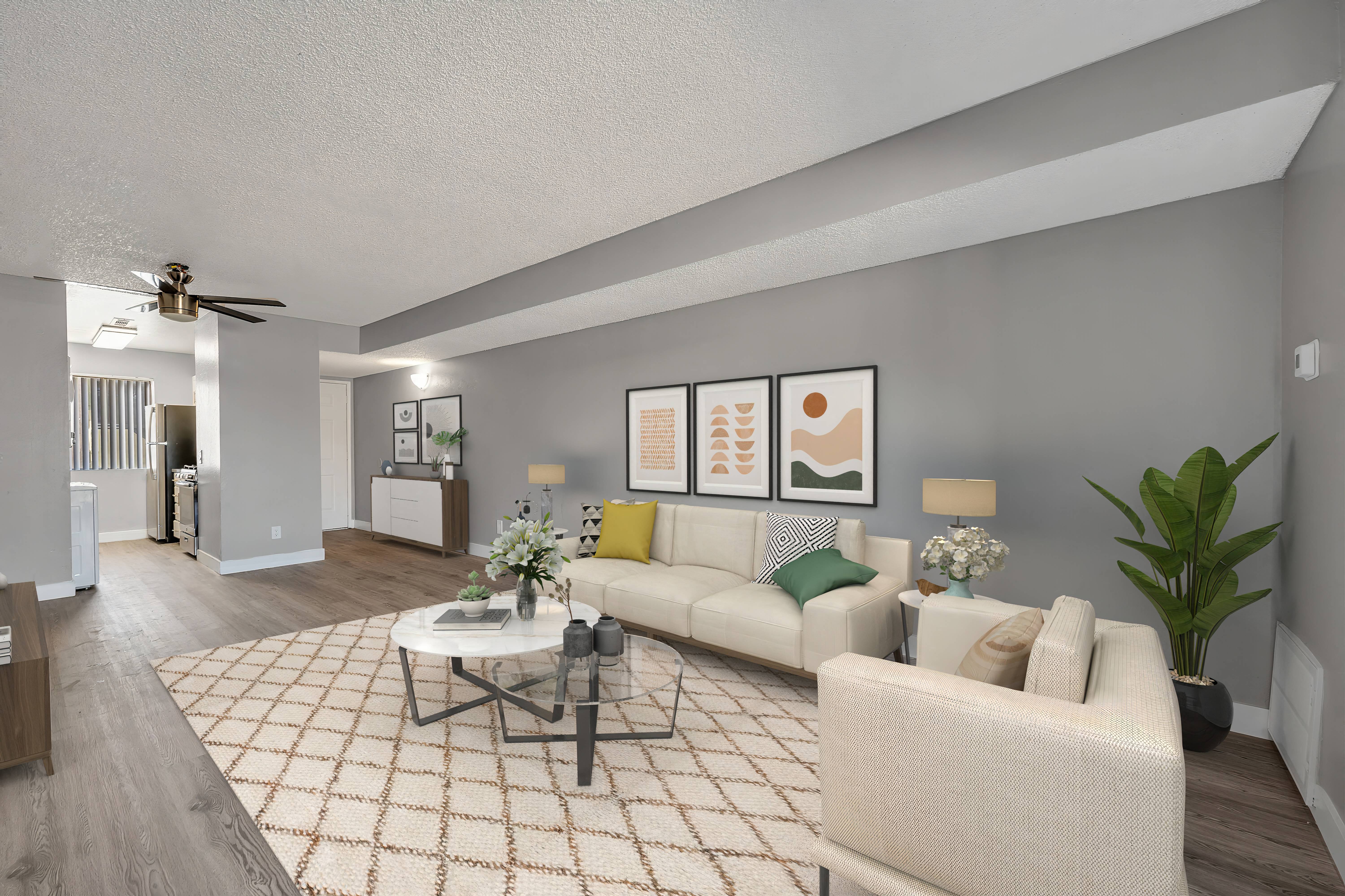 an open living room with a couch and a coffee table