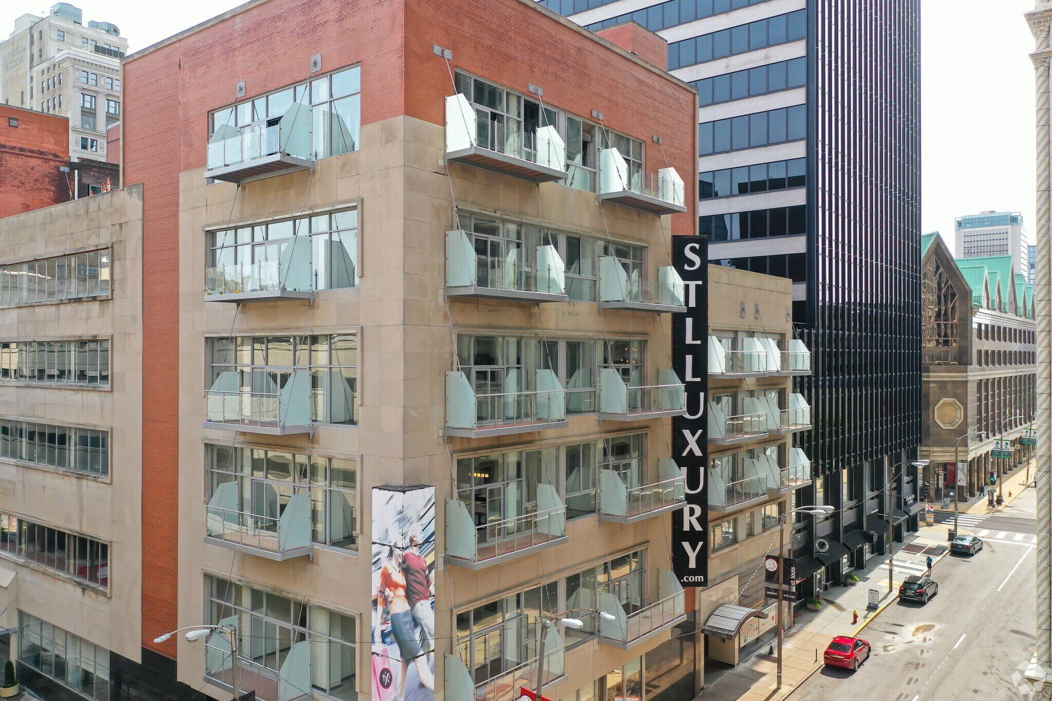 A tall building with a sign that says