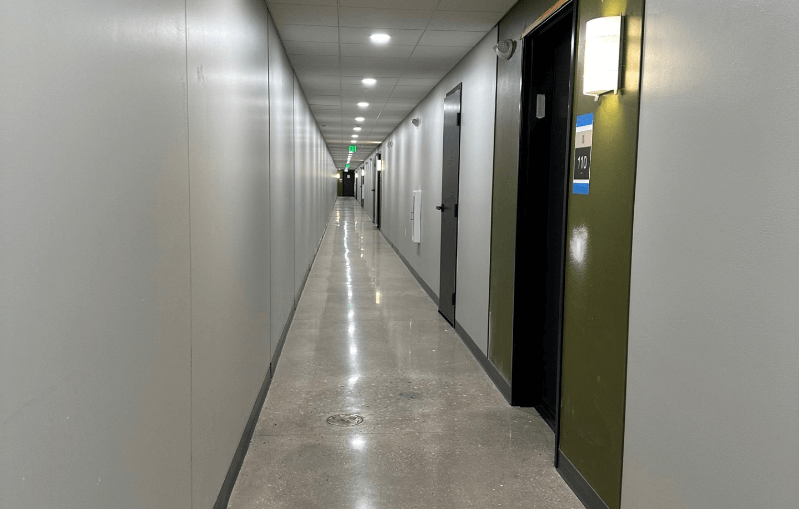 a view down a long corridor in an office building