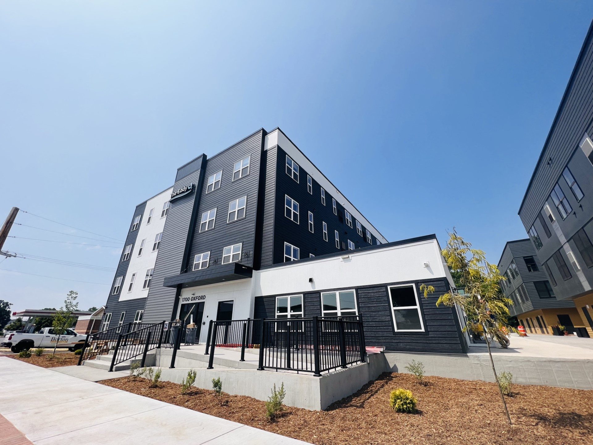 a building with a black and white facade