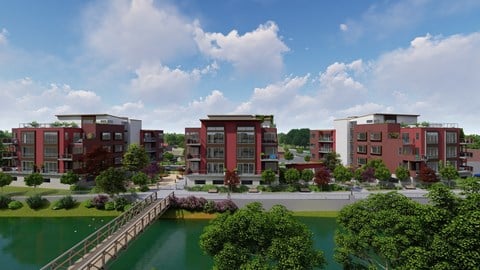Aerial view of river frontage of River Gate South Apartments in Plymouth Indiana