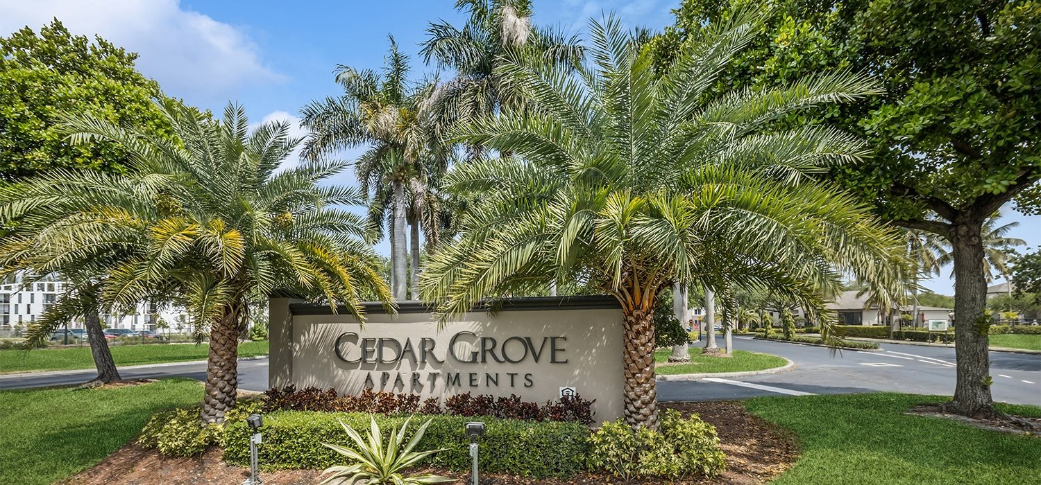 Landscaping and monument sign at Cedar Grove Apartments in Miami FL