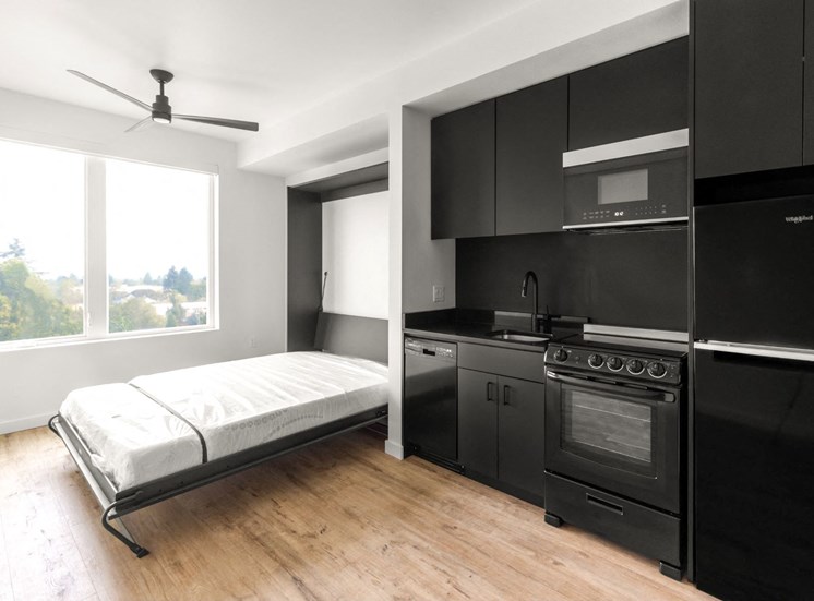 Black Kitchen And Bedroom at Nomad Apartments, Portland, Oregon