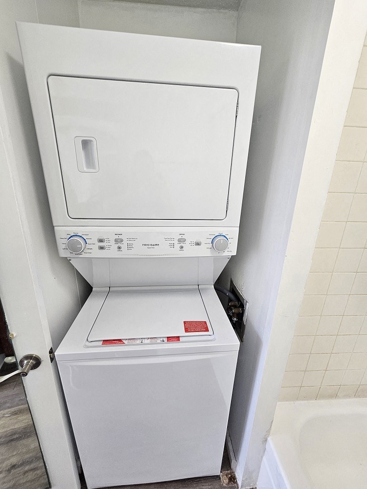a washer and dryer in a bathroom