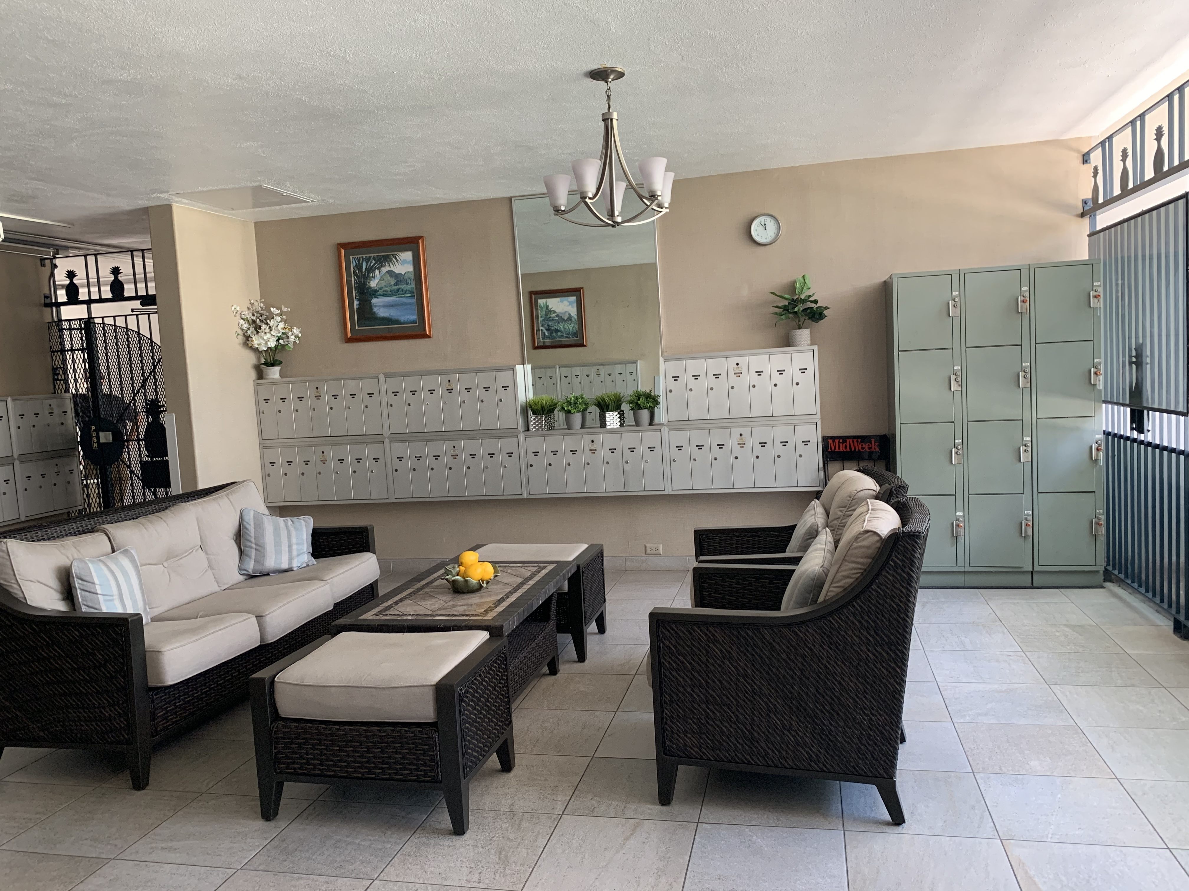 A living room with a sofa, chair, and coffee table.