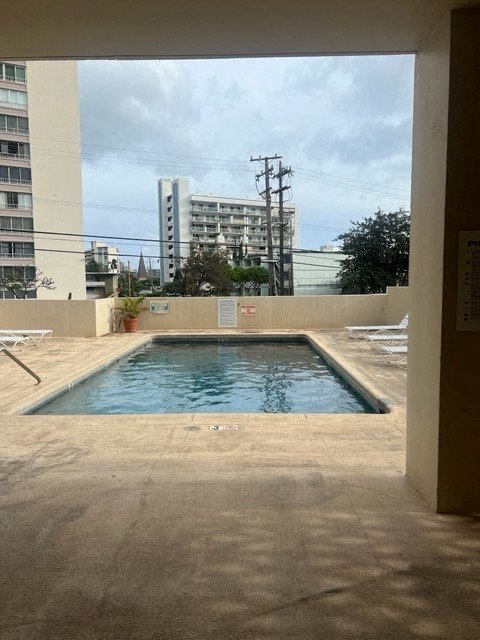 a swimming pool on the roof of a building