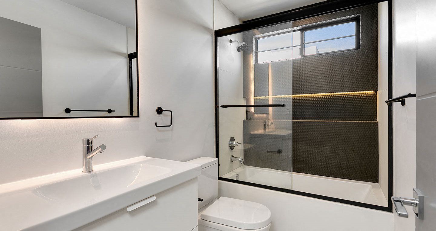 matte black finishes in the bathrooms