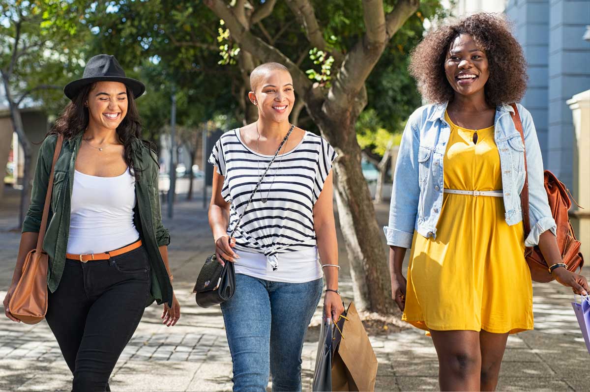 Three friends out shopping together in the South End