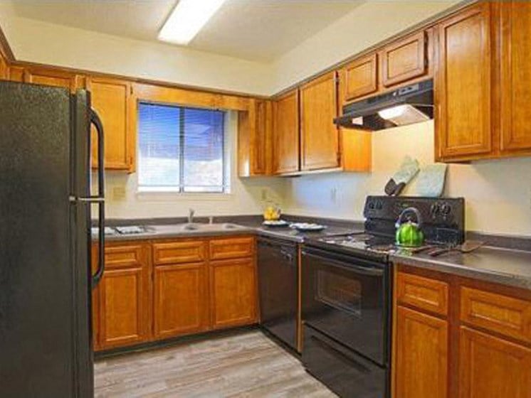 Full kitchen with window Apartments for rent in Albuquerque NM l Villa La Charles Apts