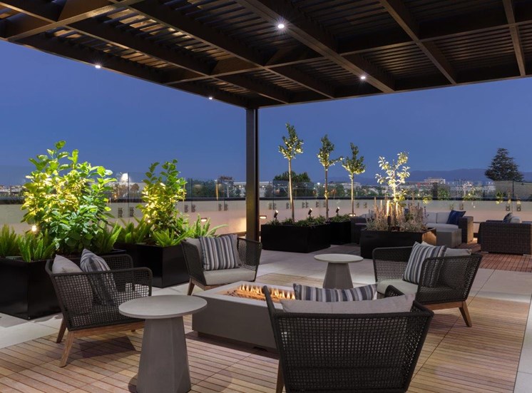 rooftop lounge with firepit and seating