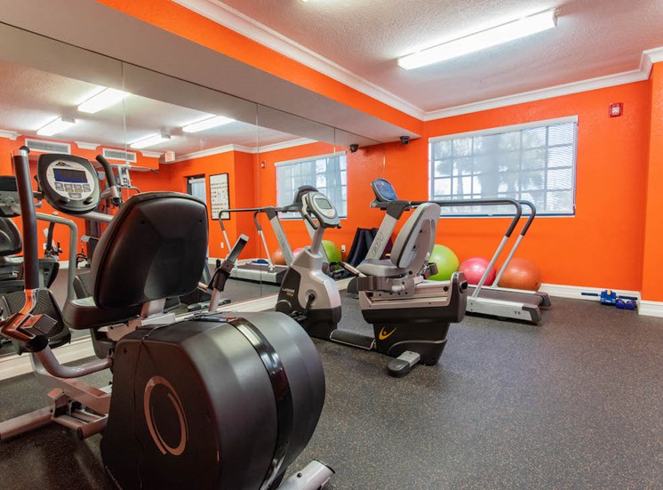 fitness center with work out equipment