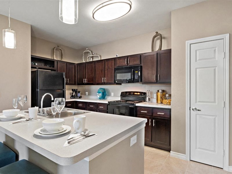 Furnished bedroom at Creed Canyon Apartments Sherman TX