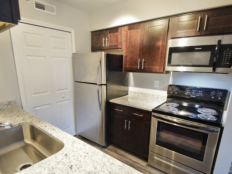 Fully Furnished Kitchen With Stainless Steel Appliances at  Integrity Medina Apartments, Integrity Realty LLC, Ohio, 44256