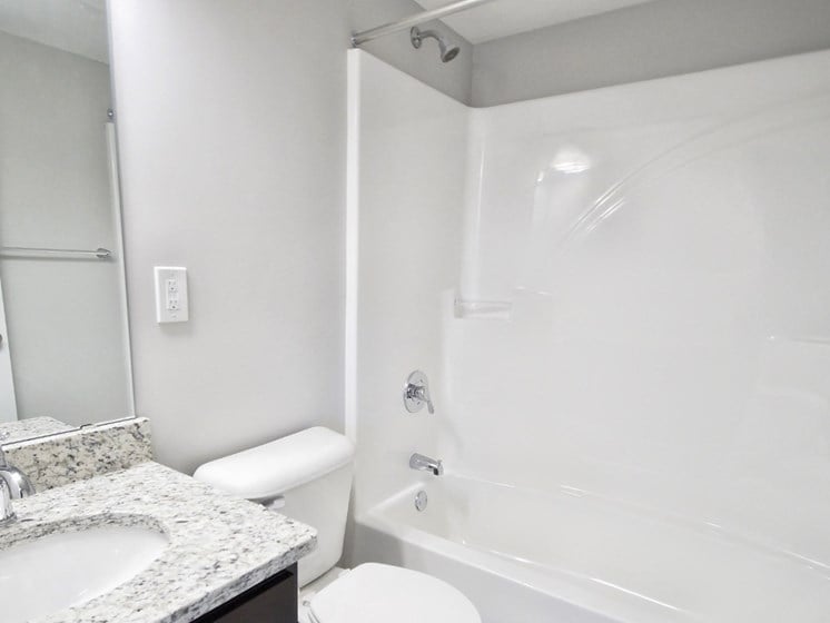 Bathroom With Bathtub at Medina Village Apartments - SPM, Integrity Realty LLC, Medina, OH