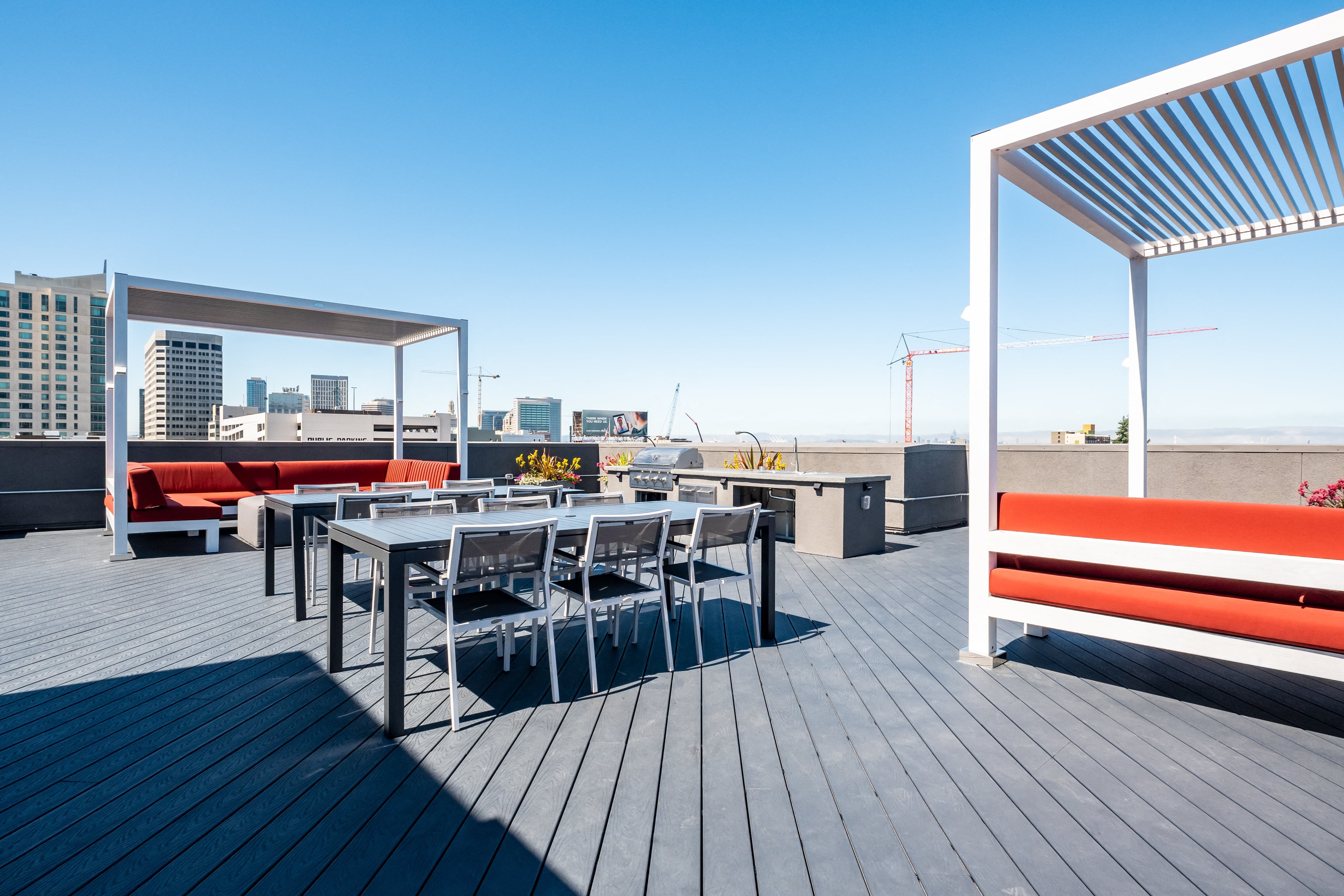 Upland Oakland, CA Apartments for Rent - Rowhaus Apartments Exterior Rooftop with Spectacular Views and Lounge Chairs