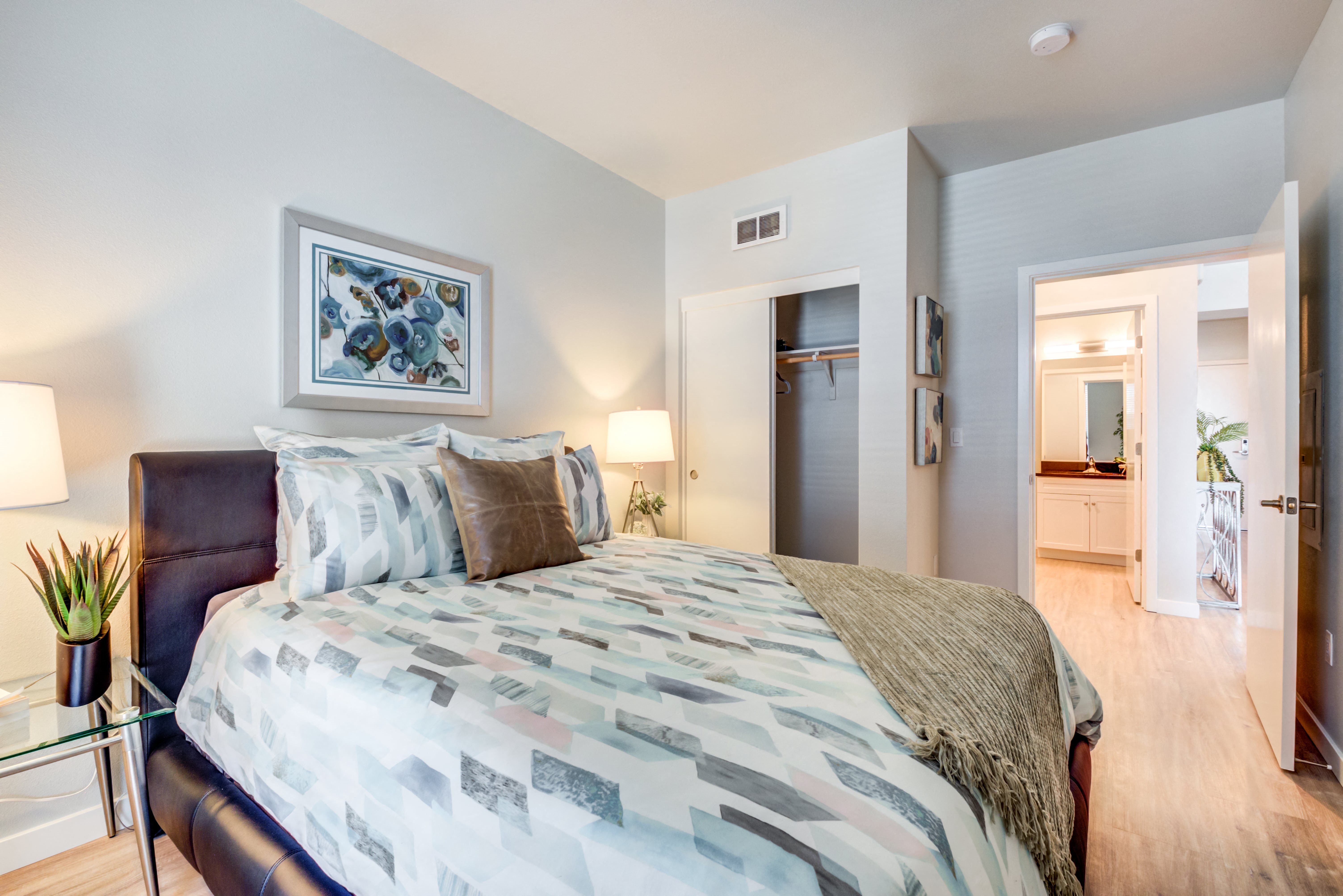Luxury One-Bedroom Apartments in Uptown Oakland, CA - Rowhaus Apartments Bedroom with Large Window and Spacious Closet
