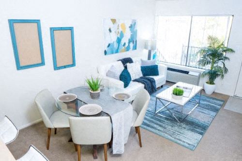 A living room in a one bedroom at Casitas