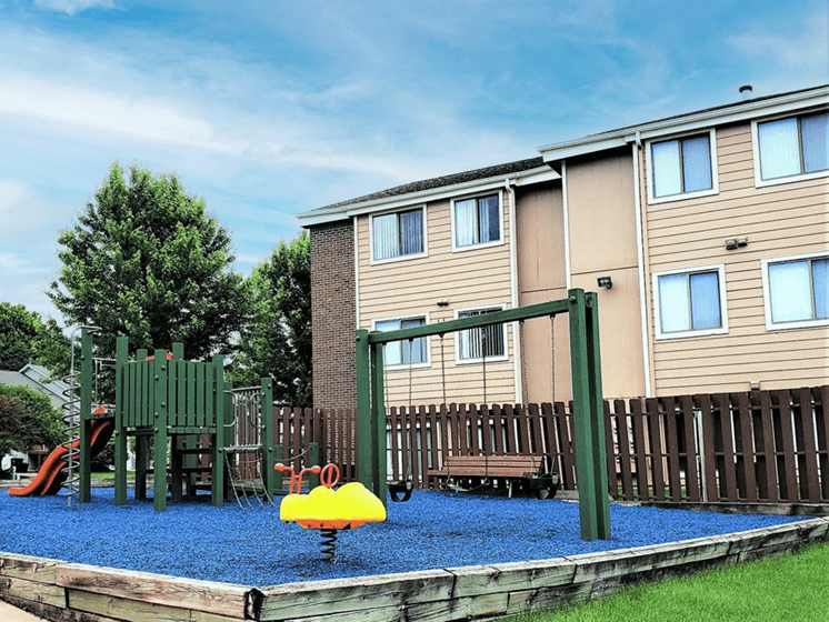 outdoor playground at Hampton at Coral Ridge apartments