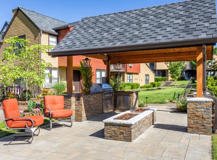 Lake Oswego OR Apartments for Rent - Westlake Meadows - Covered BBQ Area with Firepit, and Two Chairs