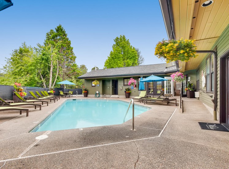 Apartments for Rent in Lake Oswego OR - Westlake Meadows - Sparkling Pool Surrounded by Lounge Seating