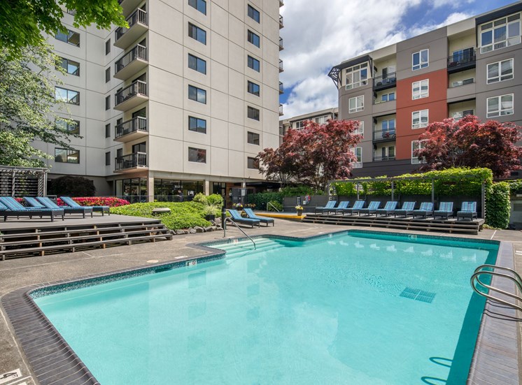 Downtown Portland OR Apartments for Rent - Linc 245 - Sparkling Pool Surrounded by Beautiful Landscaping and Comfy Lounge Seating