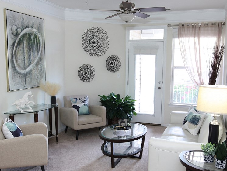 A view of the living room in the 1200 Acqua Model Apartment Home