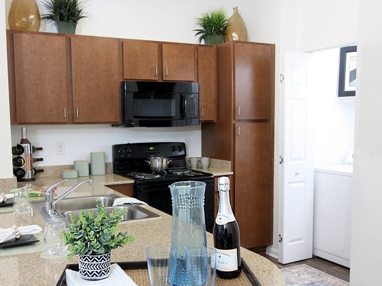 A view of the Kitchen in the 1200 Acqua model apartment home