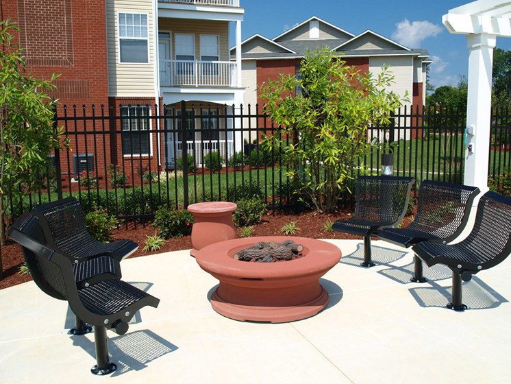 outdoor firepit and seating area daytime