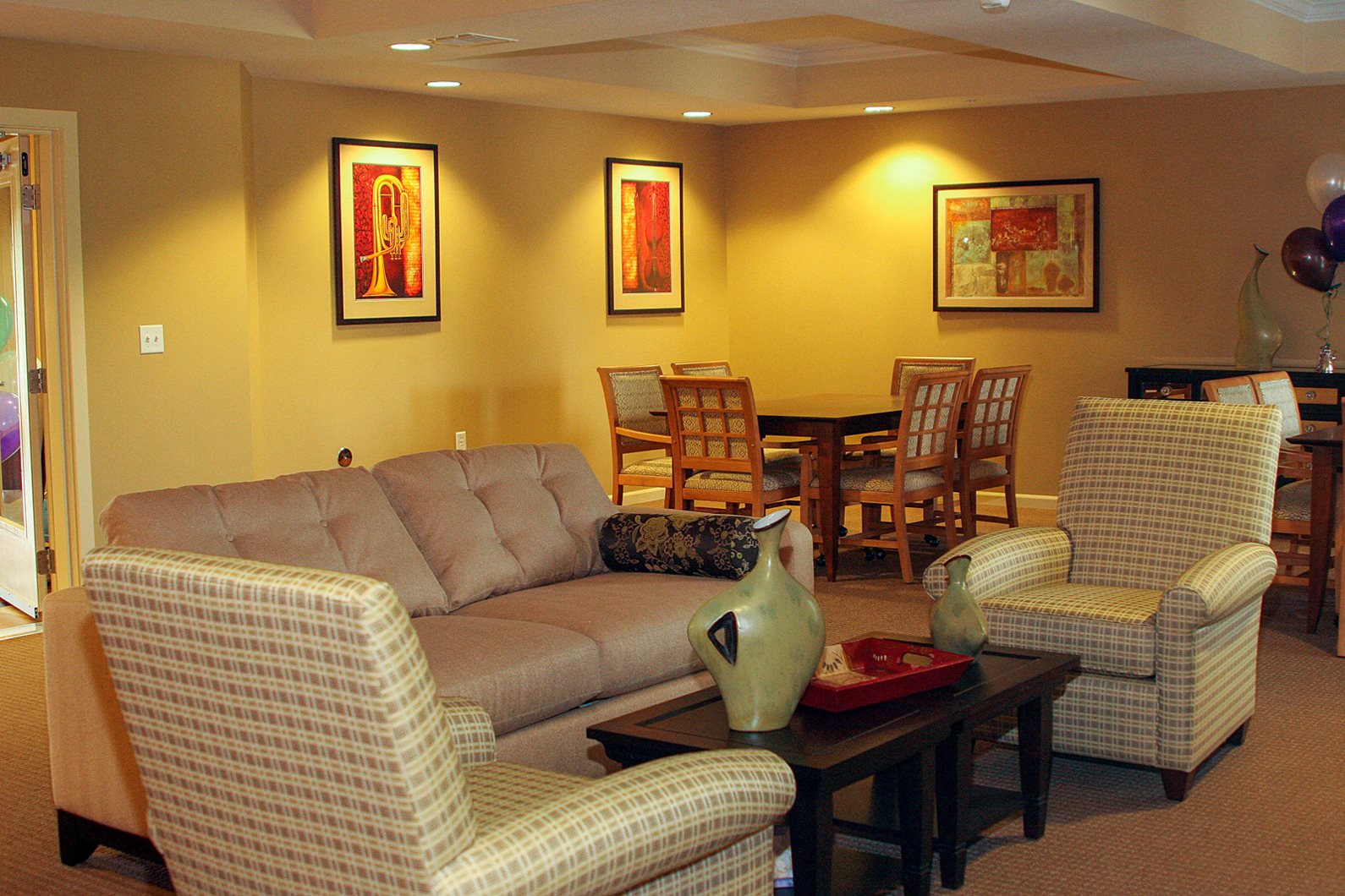 Resident Clubhouse, carpet, large seating area, fireplace