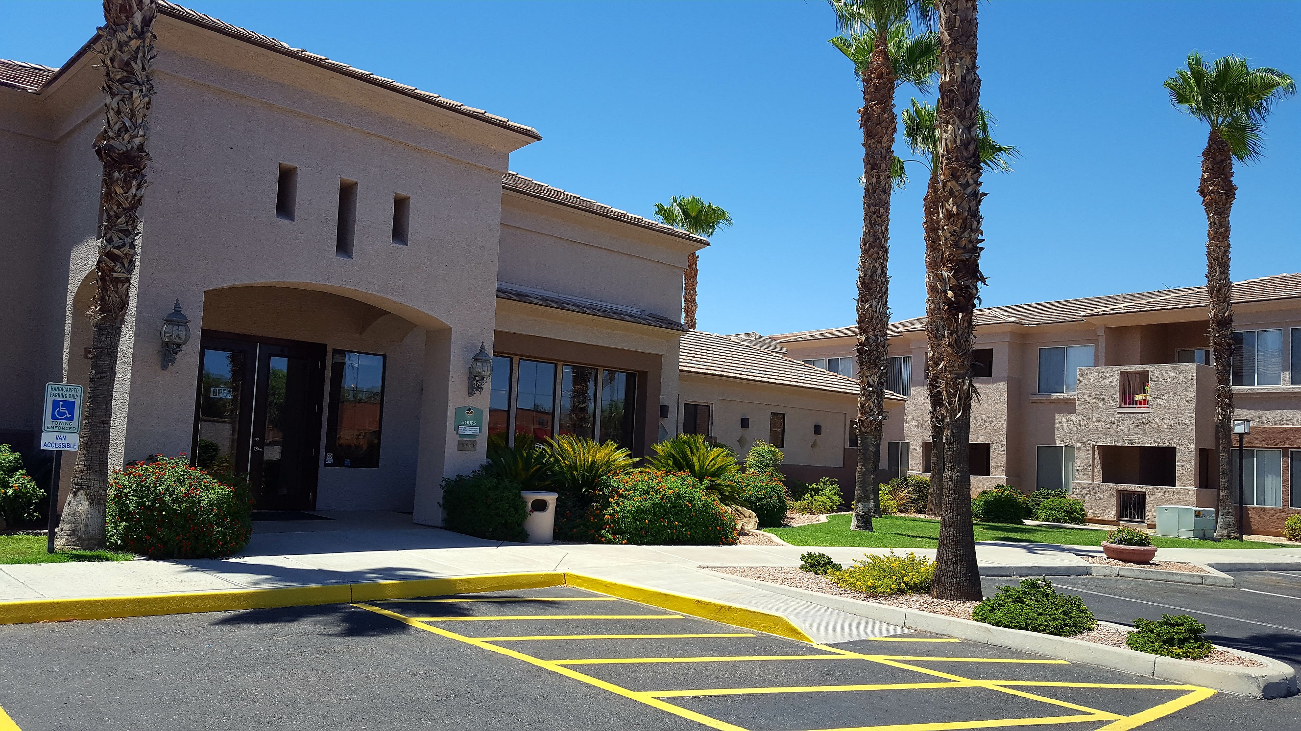 Leasing building and marked parking spaces — view 1 at Desert Vista.