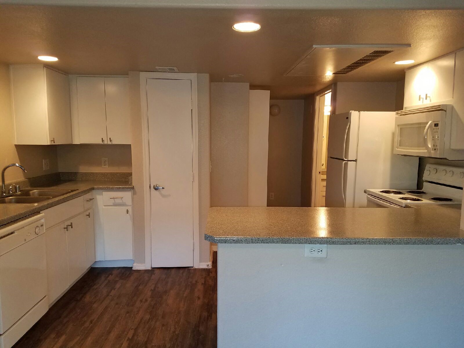 Apartment kitchen — representative home at Sun Terrace Apartments.