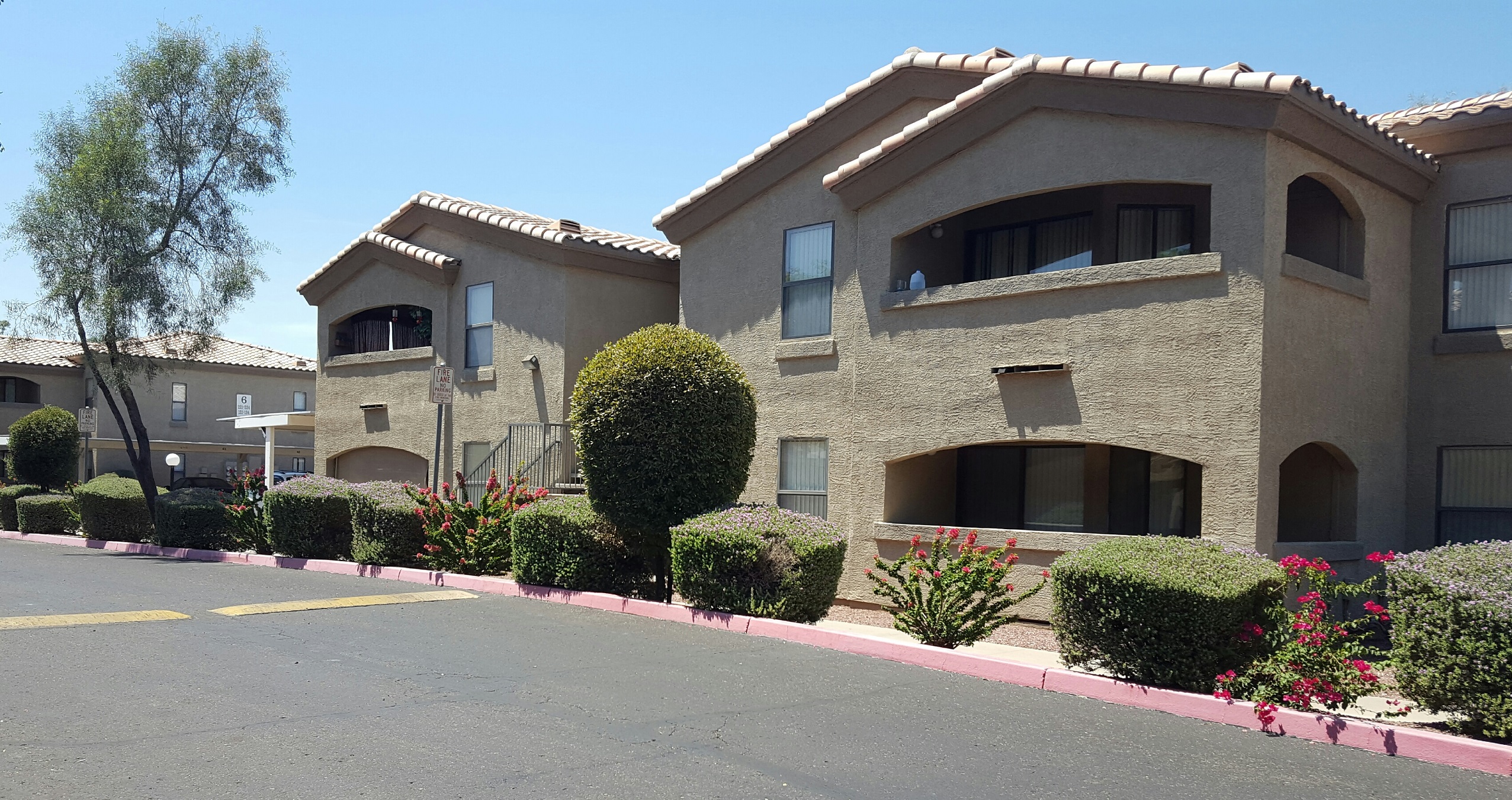 Building exterior at Sun Terrace Apartments.