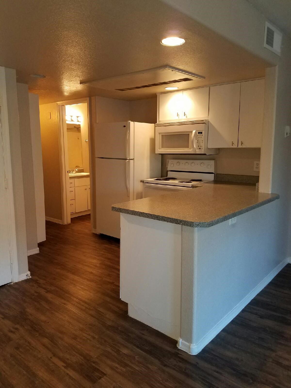 Apartment kitchen — representative home at Sun Terrace Apartments.