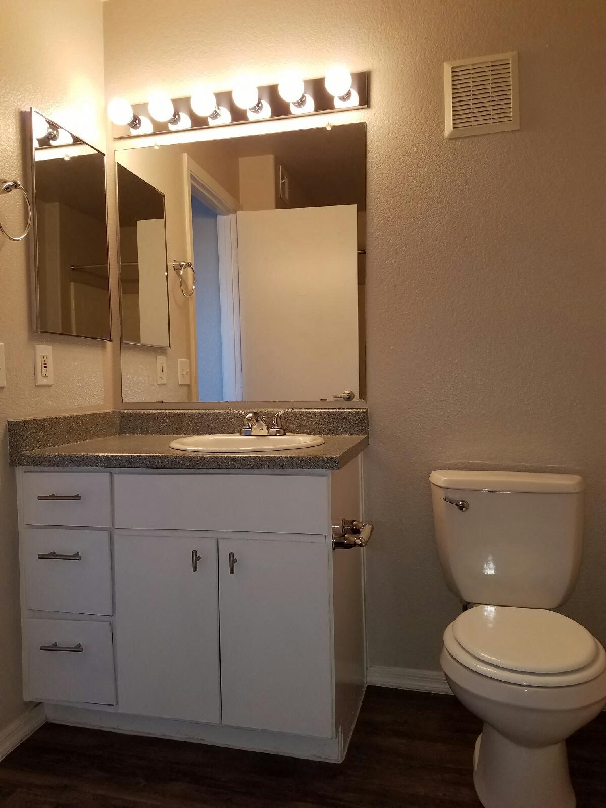 Apartment bathroom — representative home at Sun Terrace Apartments.