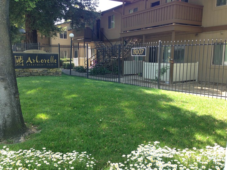 Arborelle Apartment Homes Sign, Grass, Gates, Stret Lights, Apartment Exteriors