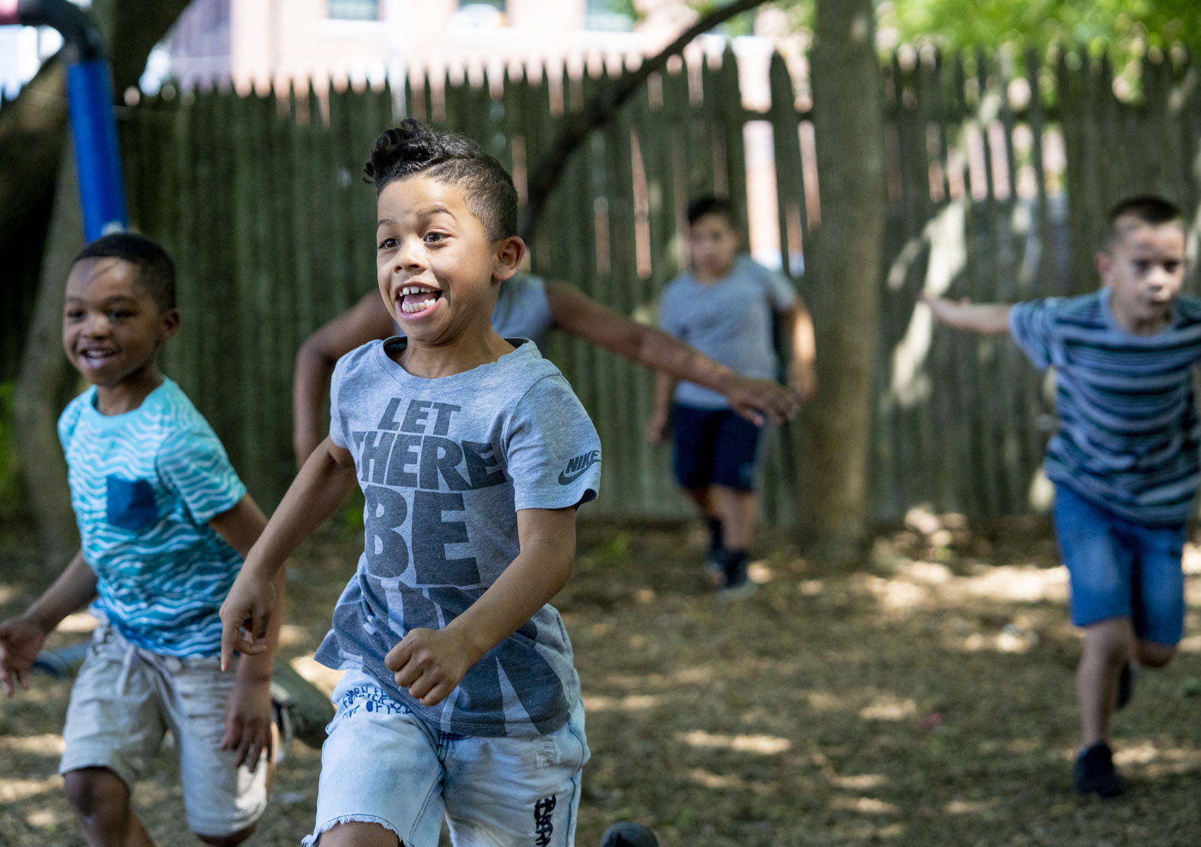 Kids at play, running and laughing