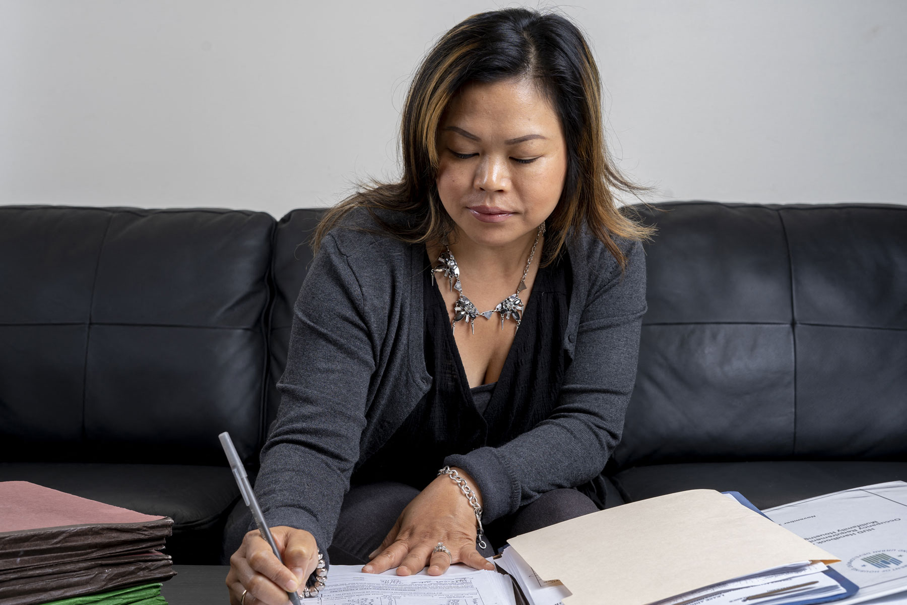 Property Manager completing paperwork